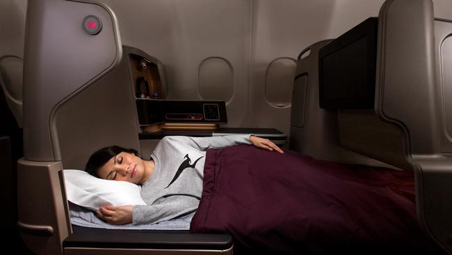 Images from Qantas to celebrate their 80th anniversary business A330 bed suite