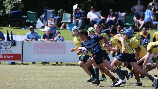 Action galleries of the junior rugby union grand finals, match played at Surfers Paradise Home Ground. Helensvale Hogs Vs Surfers Paradise Dolphins under 13s division. Picture Mike Batterham