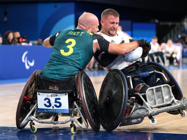 Stuart Robinson of Team Great Britain is challenged by Ryley Batt of Team Australia during the Men's Preliminary Round Group B match. Picture: Getty Images