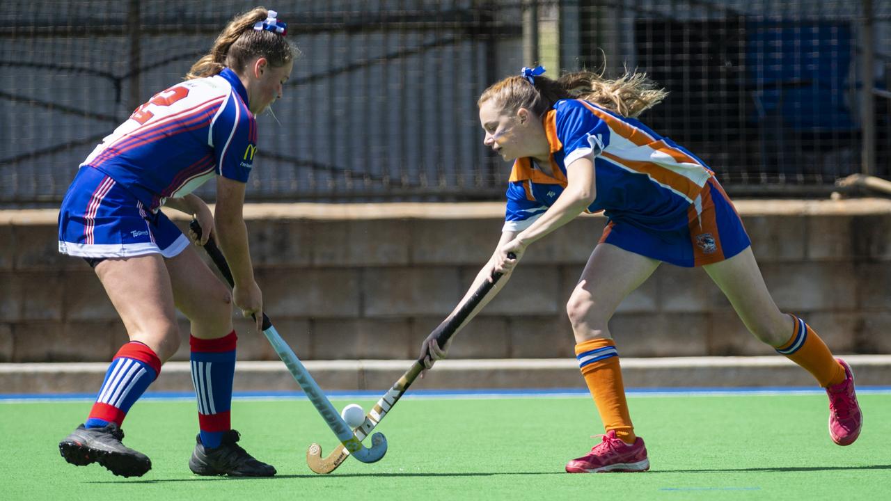 Annelies Brouwer (left) of Rangeville competes with Tahlia Hess of Newtown in J2 girls grand final hockey at Clyde Park, Saturday, September 10, 2022. Picture: Kevin Farmer