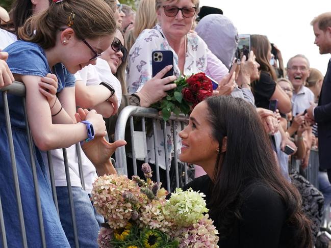 Meghan, Duchess of Sussex chats with wellwishers on the Long walk at Windsor Castle. Picture: Kirsty O'Connor / POOL / AFP