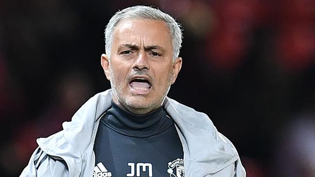 Manchester United's Portuguese manager Jose Mourinho shouts instructions to his players from the touchline during the English League Cup third round football match between Manchester United and Burton Albion at Old Trafford in Manchester on September 20, 2017. / AFP PHOTO / Paul ELLIS / RESTRICTED TO EDITORIAL USE. No use with unauthorized audio, video, data, fixture lists, club/league logos or 'live' services. Online in-match use limited to 75 images, no video emulation. No use in betting, games or single club/league/player publications.  /