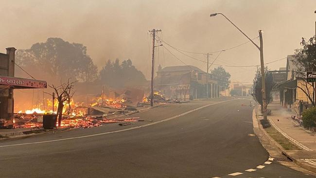 A bushfire takes hold in the main street of Cobargo.