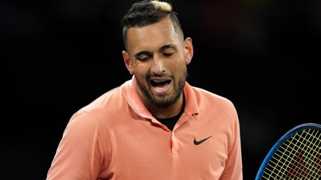 Nick Kyrgios is through to the second round of the Australian Open.