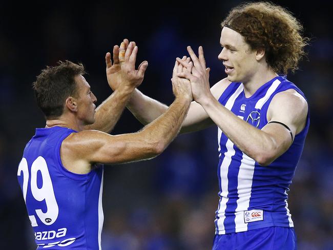 AFL: Round 4 North Melbourne V Fremantle at Etihad , Ben Brown celebrate's a goal with Brent Harvey. . 17th April 2016. Picture: Colleen Petch.