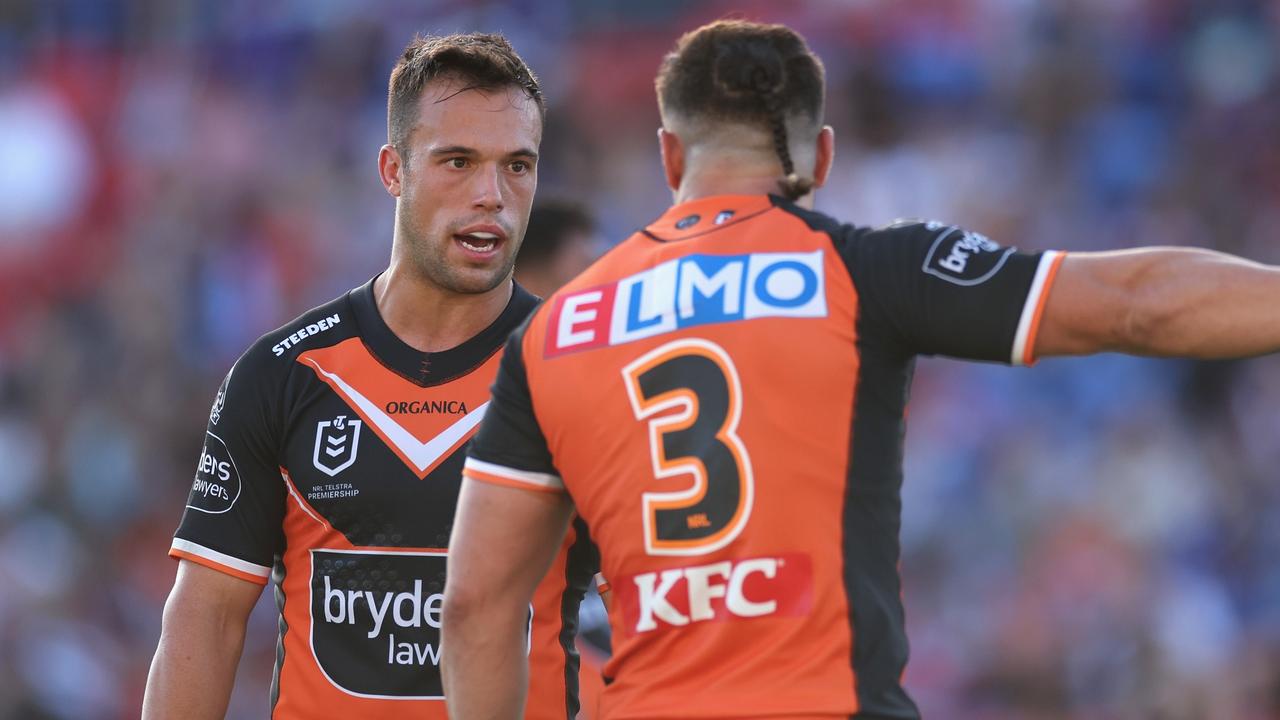 NEWCASTLE, AUSTRALIA - MARCH 20: James Roberts of the Tigers talks to Luke Brooks of the Wests Tigers during the round two NRL match between the Newcastle Knights and the Wests Tigers at McDonald Jones Stadium, on March 20, 2022, in Newcastle, Australia. (Photo by Cameron Spencer/Getty Images)