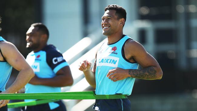 Israel Folau during the Waratahs warm up of their training session on Tuesday. Picture. Phil Hillyard