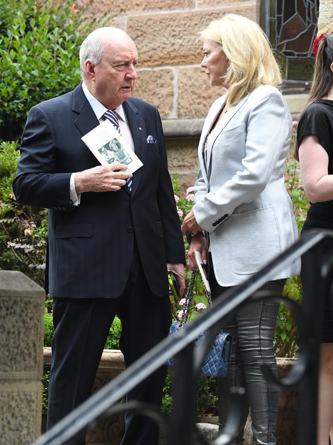 Alan Jones and Kerri-Anne Kennerley outside the funeral.