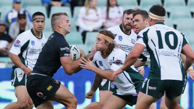 Mounties Finlay Dibley runs into St Marys Cam Collins. Picture: Justin Sanson.