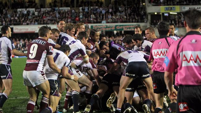 The fight spilled out onto the sideline. Picture: Renee McKay