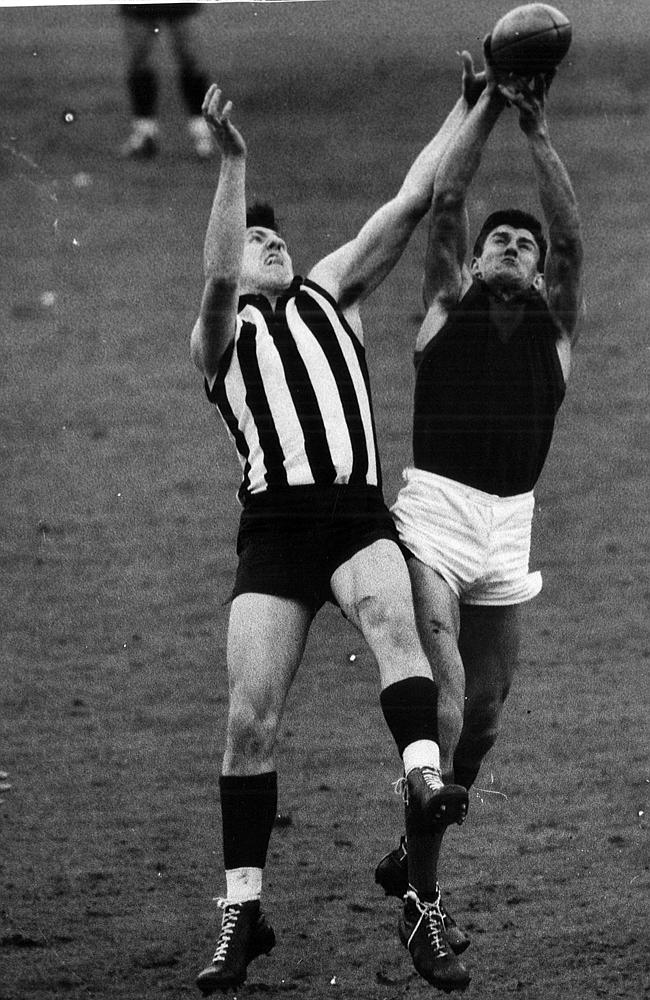 Melbourne’s Graham Wise marks in the 1964 Grand Final against Collingwood.