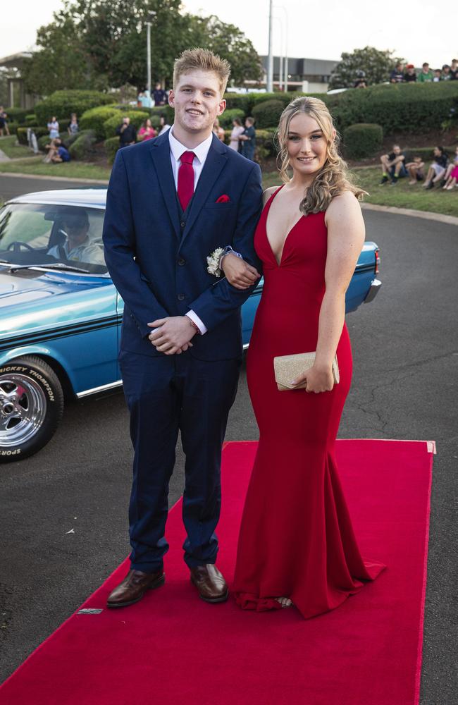 Graduates Harrison Thurston and Neve Knapman arrive at Mary MacKillop Catholic College formal at Highfields Cultural Centre, Thursday, November 14, 2024. Picture: Kevin Farmer