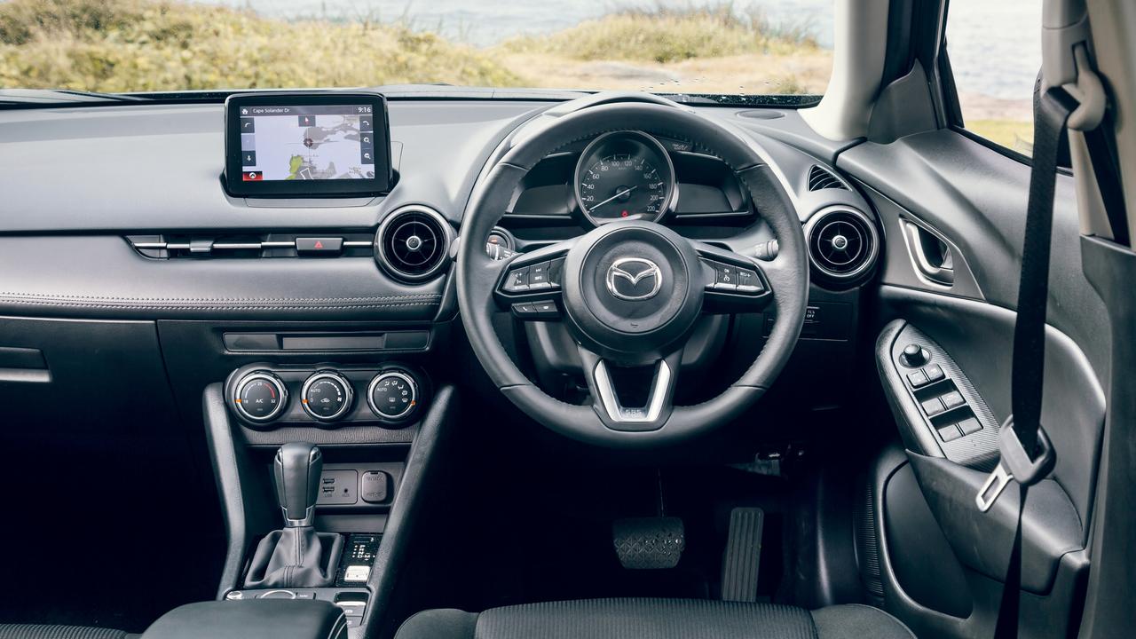 The CX-3’s cabin is old and road noise is still a big issue. Shot by Thomas Wielecki.