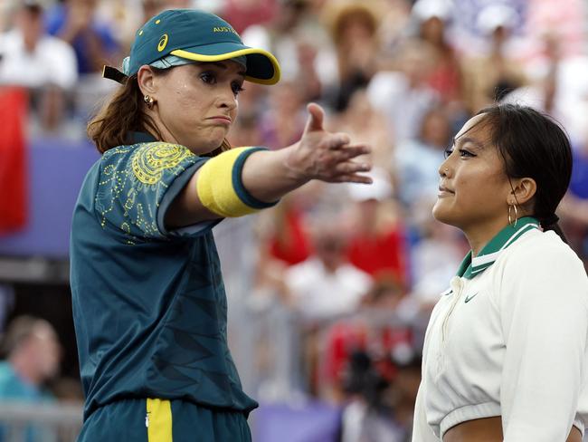 Australia's Rachael Gunn (L), known as Raygun gestures next to US' Logan Edra, known as Logistx, during their battle as part of the Women's Breaking dance Round robin of the Paris 2024 Olympic Games at La Concorde in Paris, on August 9, 2024. (Photo by Odd ANDERSEN / AFP)