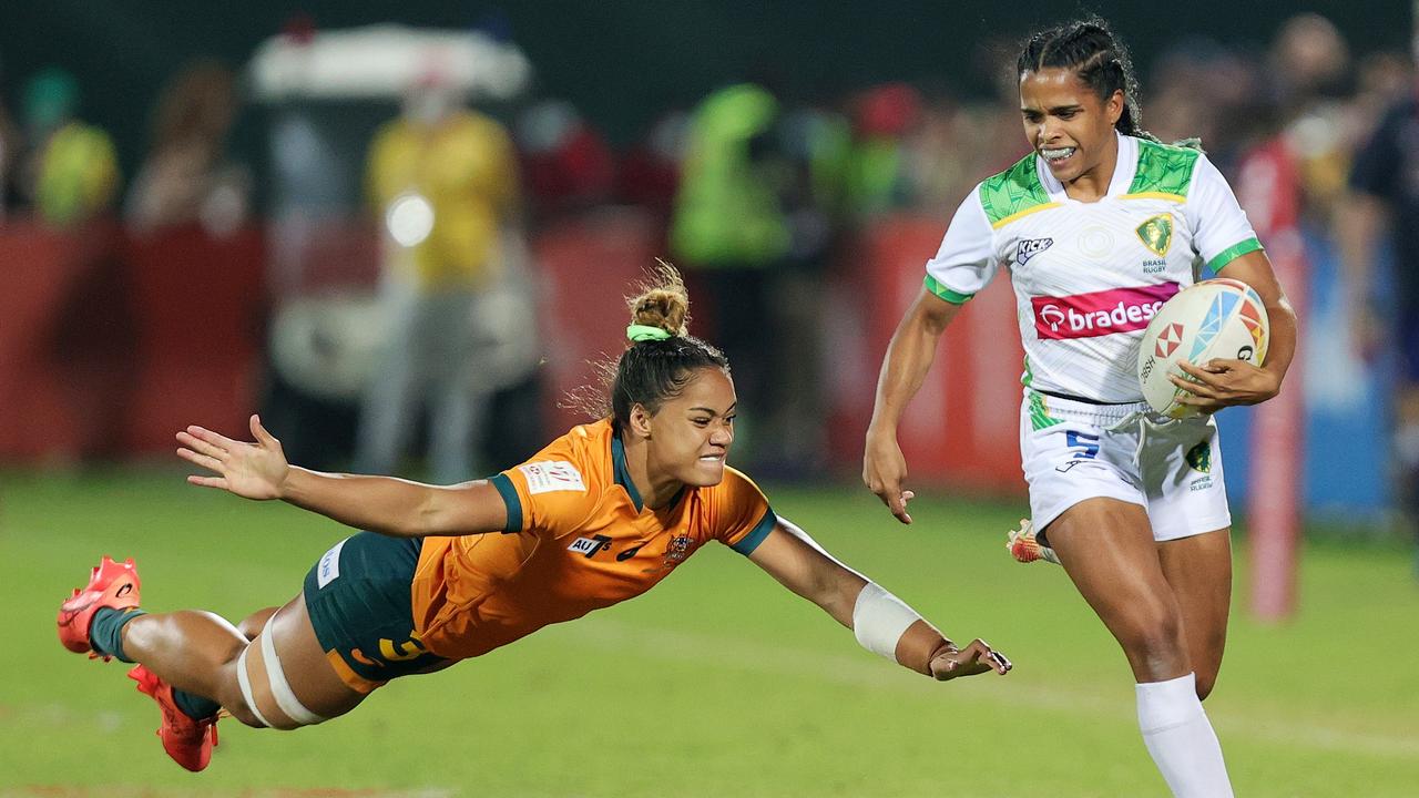 Thalia Costa of Brazil evades the Faith Nathan in an early match at the event.