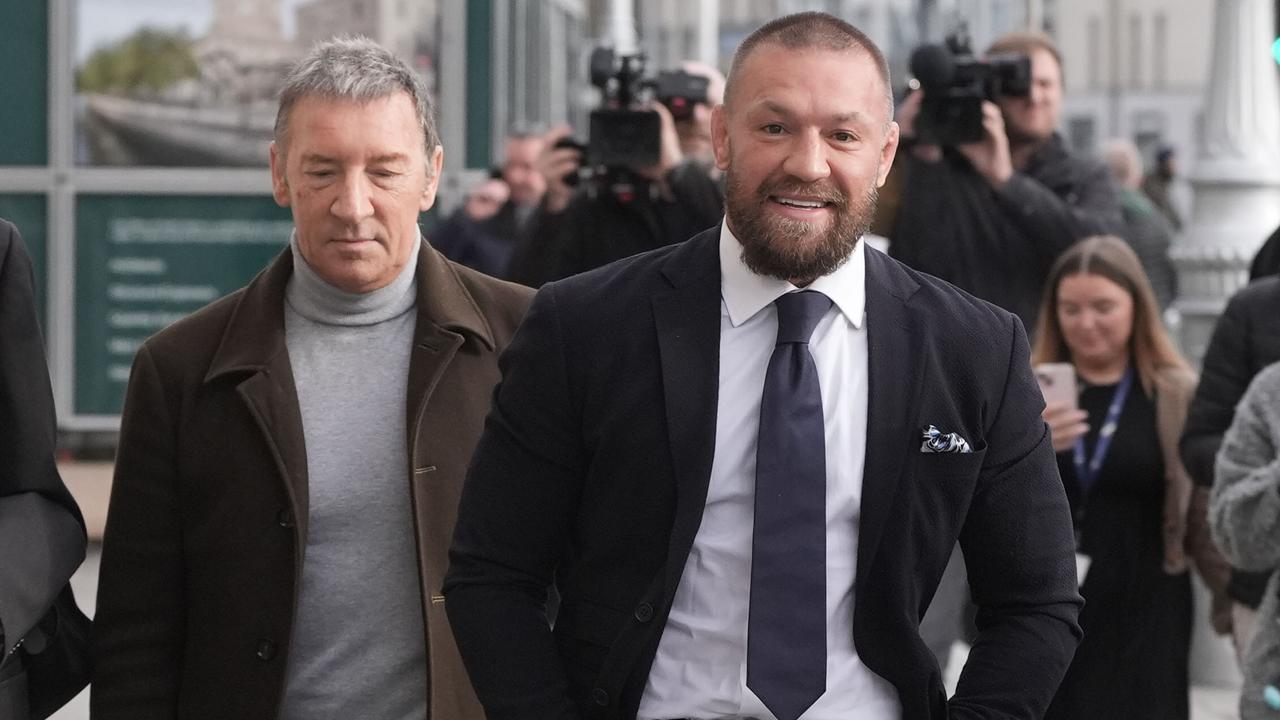 Mixed Martial Arts fighter Conor McGregor with his father Tony McGregor (left) outside the High Court in Dublin. (Photo by Niall Carson/PA Images via Getty Images)