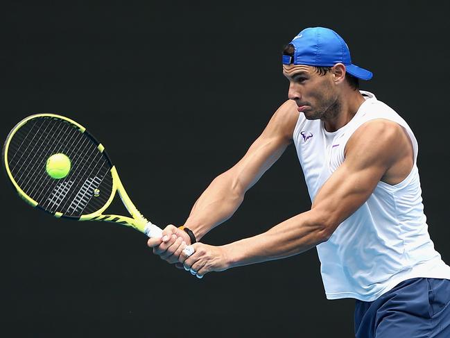 Rafael Nadal of Spain plays a backhand during an Australian Open practice session at Melbourne Park in Melbourne, Friday, January 17, 2020. (AAP Image/Rob Prezioso) NO ARCHIVING, EDITORIAL USE ONLY