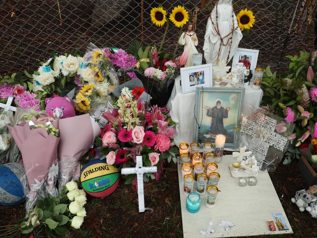 Messages left at the roadside memorial on Bettington Rd, Oatlands. Picture: John Grainger