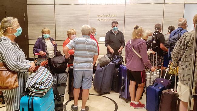 Norwegian Jewel passengers arrive at a hotel in Sydney for 14 days of self-isolation. Picture: Tom Huntley