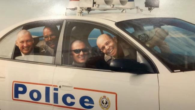 Jason Doig pictured with colleagues during his early days of policing. Picture: Facebook