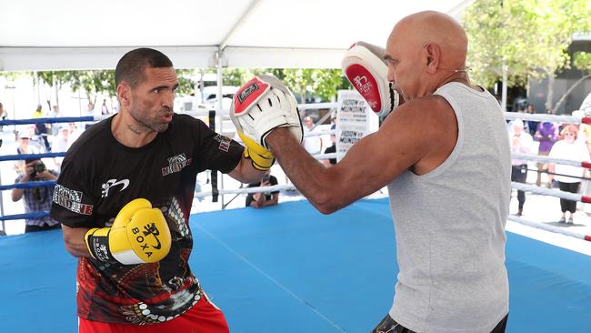 Anthony Mundine sparring with his father Warren in Brisbane. Picture: Peter Wallis