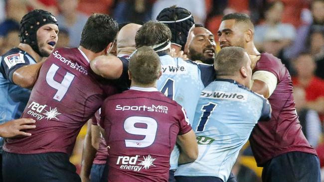 A melee breaks out during the Round 8 Super Rugby match between the Queensland Reds and the NSW Waratahs at Suncorp Stadium in Brisbane, Saturday, April 29, 2017. (AAP Image/Glenn Hunt) NO ARCHIVING, EDITORIAL USE ONLY