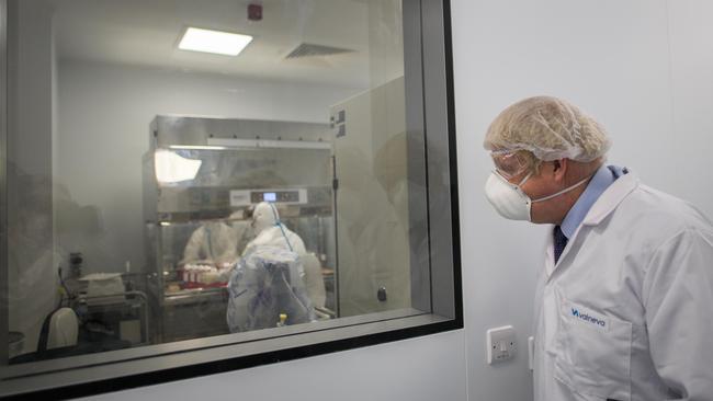 Britain's Prime Minister Boris Johnson visits the French biotechnology laboratory Valneva in Livingston, west Scotland, on January 28. Picture: AFP