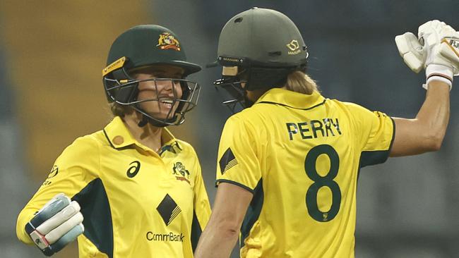 MUMBAI, INDIA - DECEMBER 28: Phoebe Litchfield of Australia celebrates after scoring a fifty during women's One Day International Match between India and Australia at Wankhede Stadium on December 28, 2023 in Mumbai, India. (Photo by Pankaj Nangia/Getty Images)