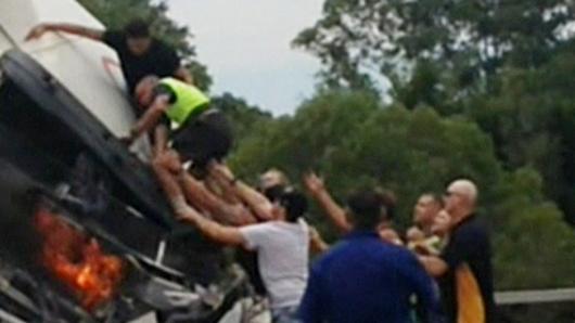 the moment the truck driver being rescued by Athen Barnaby at Nerang on the M1