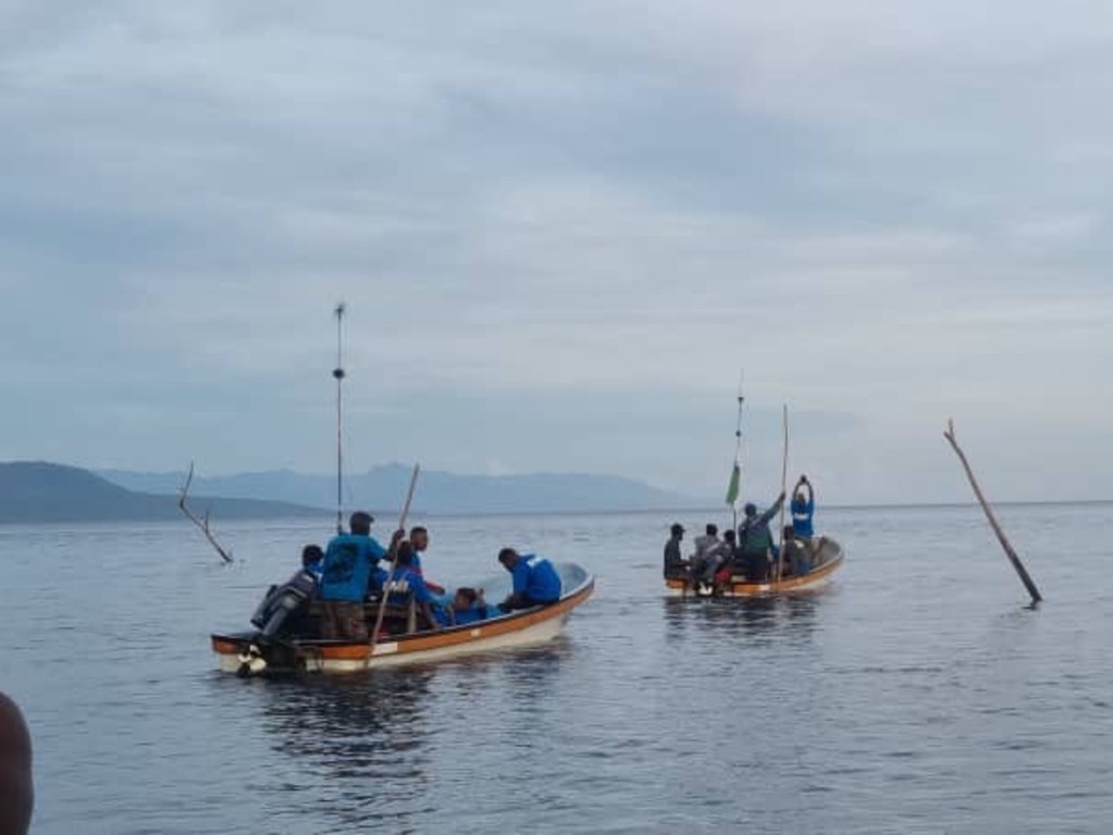 The insane 36-hour commute saw the players on trucks, buses, boats, planes and even walking through swamps. Picture: Mathias Yoba