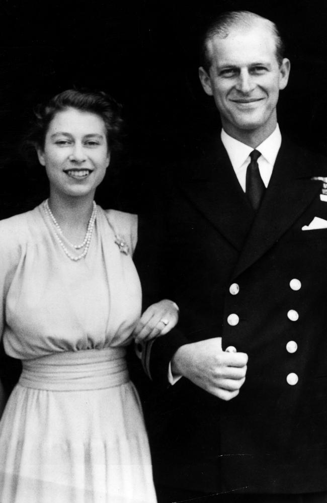 July 10, 1947: These happy photos show Princess Elizabeth and Lieutenant Philip Mountbatten, the former Prince Philip of Greece, at Buckingham Palace for their official engagement photo. Picture: Hulton Archive/Getty Images