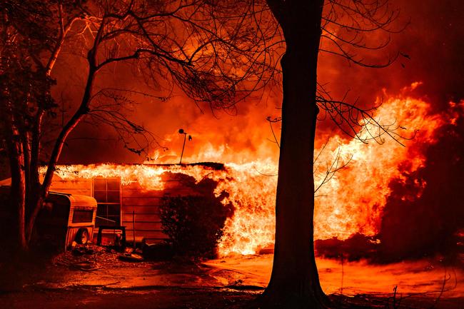 Firefighters have been faced with flames fanned by hurricane-force winds. Picture: AFP