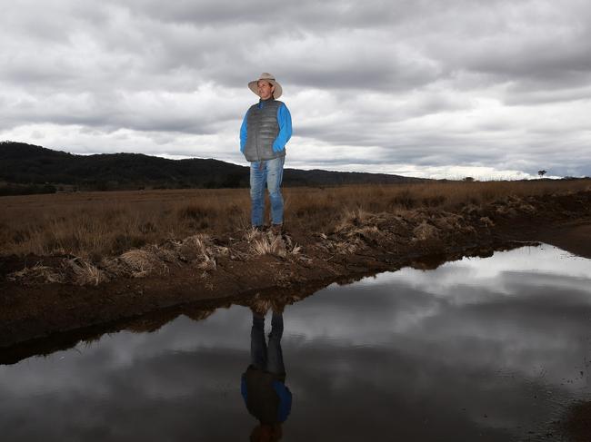 Dark clouds forming over farmer Sam Summut’s farm in Tenterfield, where rain fell for the first time in months. Picture: Peter Lorimer