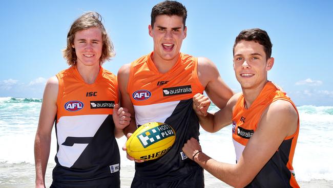 Boyd with Cameron McCarthy and Josh Kelly after being drafted. Picture: Wayne Ludbey