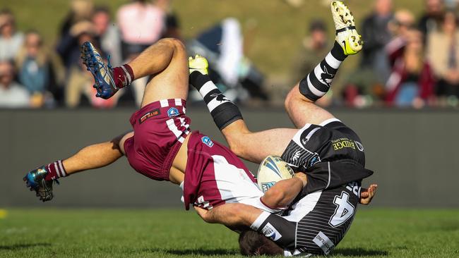 The tackle of the game in Sunday’s grand final. Picture: Julian Andrews..