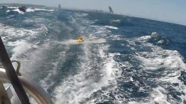 Bishop afloat in the ocean before she’s scooped up by rescue boat. Picture: Craig Greenhill