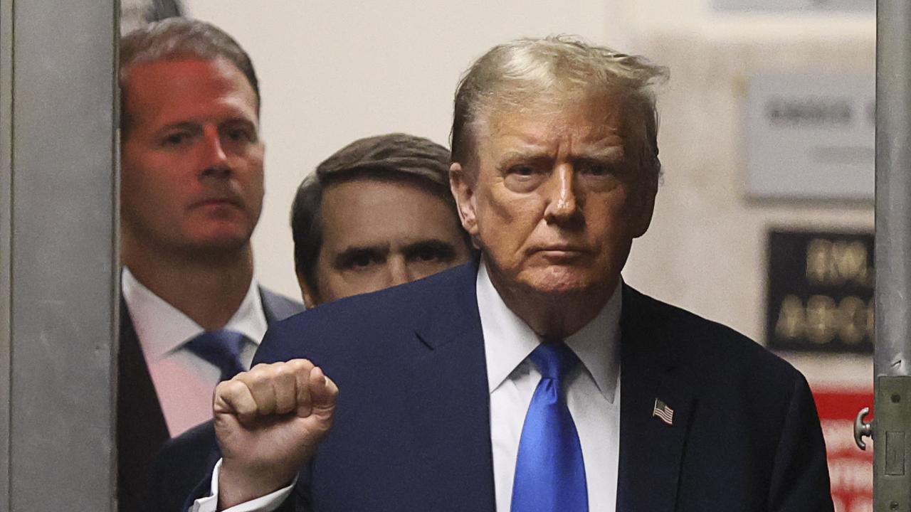 Former US President Donald Trump gestures as he returns from a recess in his trial for allegedly covering up hush money payments. Picture: AFP