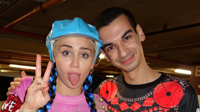 Miley Cyrus with Beau Lamarre.