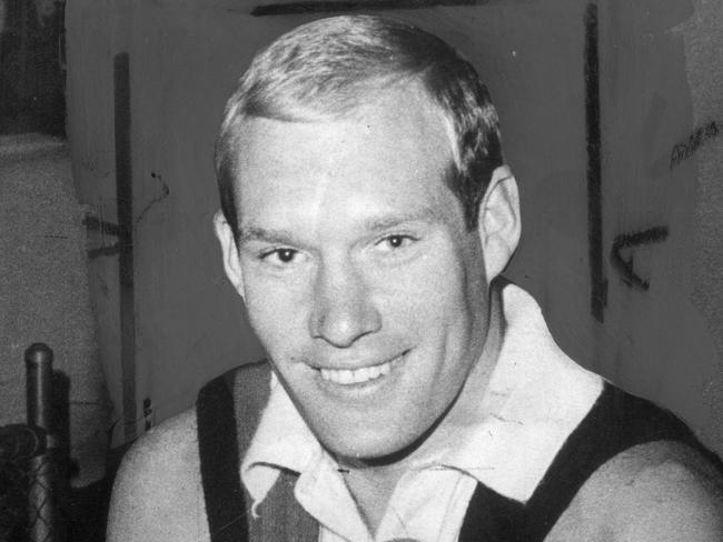 08/07/1969. Carl Ditterich laces up a new pair of football boots before St Kilda training at Moorabbin. Australian Rules Football.  Neg no: BD15244.