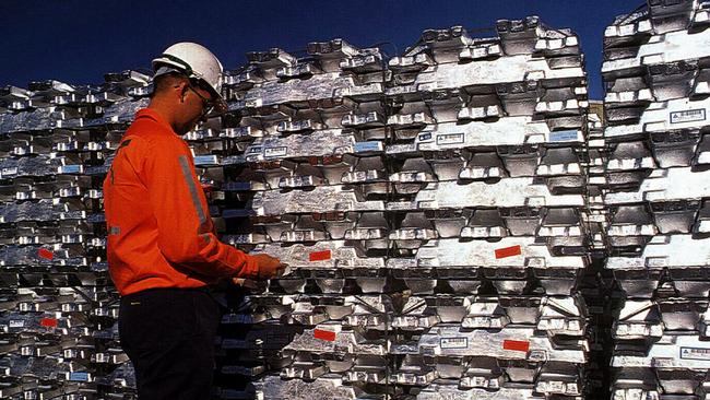 Aluminium ingots await export at Comalco group's Boyne Smelters as company posted $236 million profit at AGM 22/02/99. Industry / Mining