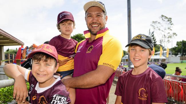 Watching the players arrive are Dalby dad Patrick Dobson with his sons (from left) Archie, Michael and Ollie Dobson at the Brisbane Broncos Captain's Run and Toowoomba Fan Day at Toowoomba Sports Ground, Saturday, February 15, 2025. Picture: Kevin Farmer