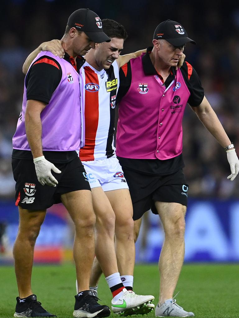 Gresham is carried from the field. Picture: Getty Images