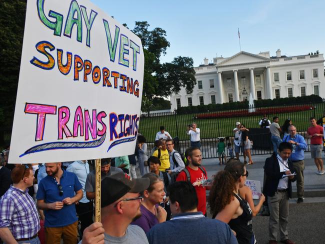 Protesters gather in front of the White House in July to protest President Donald Trump's ban on transgendered people serving in the US military. Picture: AFP Photo/Paul J. Richards