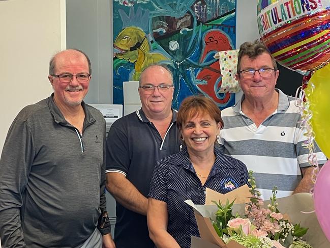 Madelina Agius celebrated 20 years at Mackay Reef Fish with Graham Caracciolo, David Caracciolo, and Brian Caracciolo in 2024. Photo: Contributed