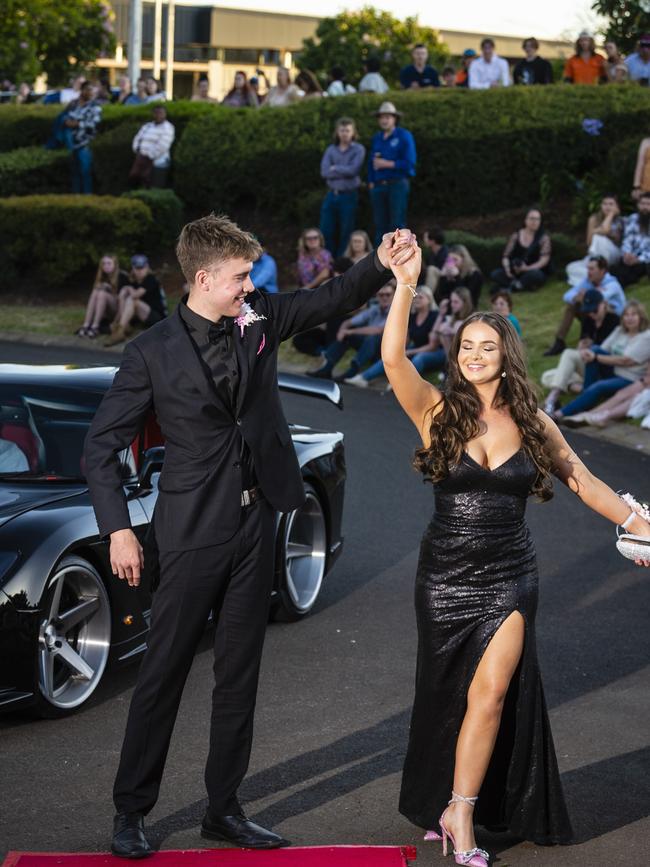 Harry Naumann and Sophie Quade arrive at Harristown State High School formal at Highfields Cultural Centre, Friday, November 18, 2022. Picture: Kevin Farmer