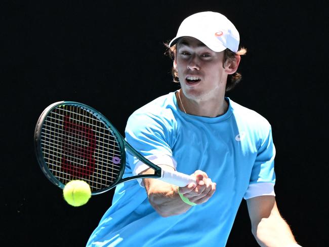 Alex de Minaur of Australia hits a return during a training session ahead of the Australian Open tennis tournament in Melbourne on January 7, 2025. (Photo by William WEST / AFP) / --IMAGE RESTRICTED TO EDITORIAL USE - STRICTLY NO COMMERCIAL USE--