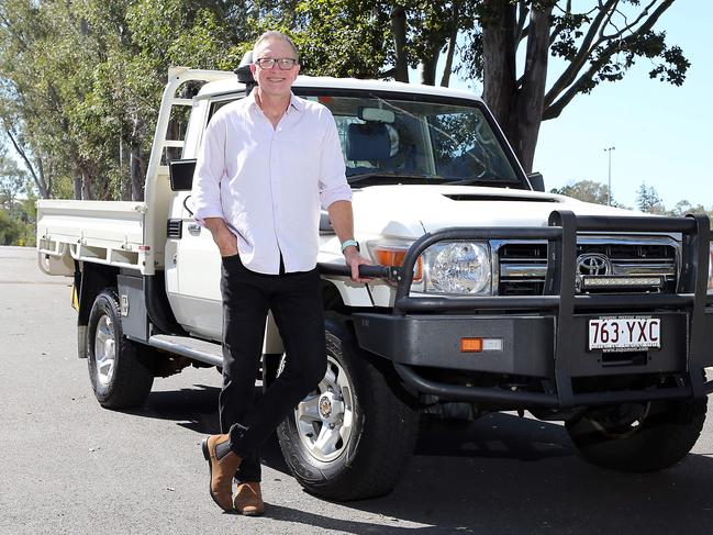 Former Wallabies fullback turned broadcaster Greg Martin with his Toyota LandCruiser ute. Picture: AAP