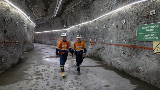 Workers walk through a tunnel in the Oyu Tolgoi copper mine. Picture: SeongJoon Cho/Bloomberg