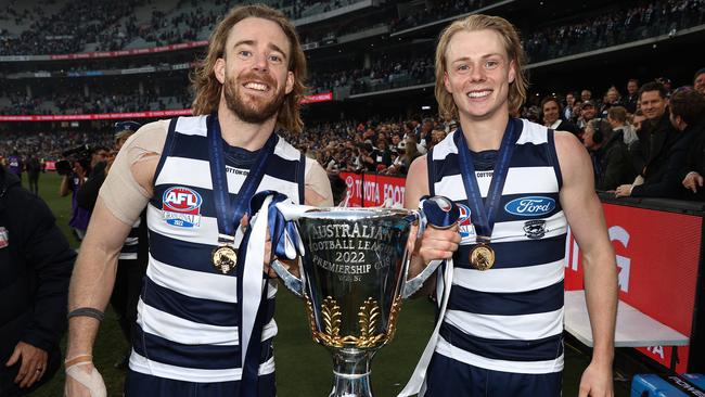 Cameron Guthrie and Zach Guthrie with the 2022 premiership cup. Picture: Michael Klein