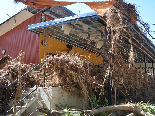 The remains of the Bana Yirriji Art and Cultural Centre and cafe at Wujal Wujal after the flood that peaked on December 17. Picture: Bronwyn Farr